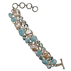 Magnificent bracelet of Biwa Pearl, Blue Topaz, and Larimar Bezel set in Silver